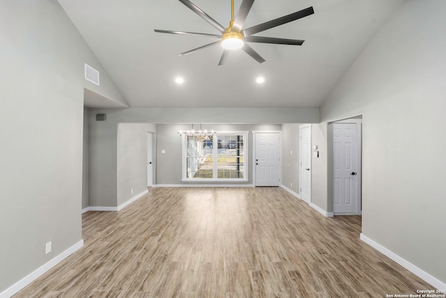 2723 Woodline, San Antonio, TX 78251 - unfurnished living room featuring a chandelier, ceiling fan, high vaulted ceiling, baseboards, and wood finished floors