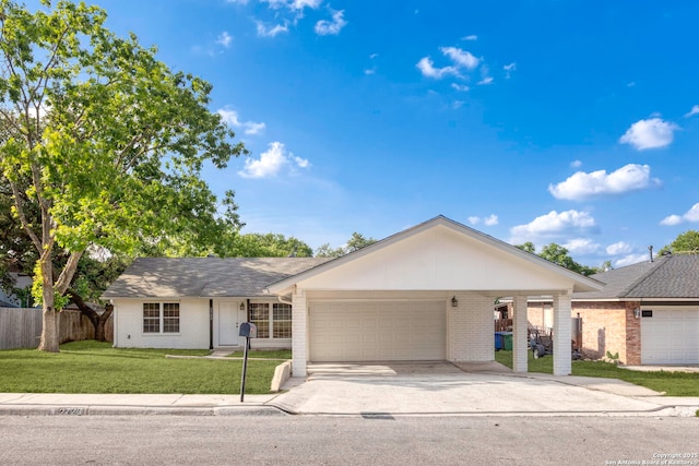 2723 Woodline, San Antonio, TX 78251 - ranch-style home with brick siding, concrete driveway, and an attached garage
