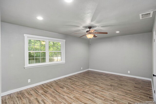 2723 Woodline, San Antonio, TX 78251 - empty room featuring ceiling fan, wood finished floors, recessed lighting, and baseboards
