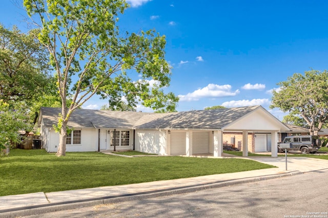 2723 Woodline, San Antonio, TX 78251 - ranch-style home featuring concrete driveway, a front yard, a garage, and brick siding