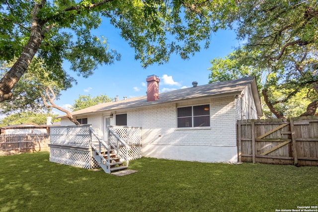2723 Woodline, San Antonio, TX 78251 - rear view of property featuring brick siding, a wooden deck, a chimney, and a gate