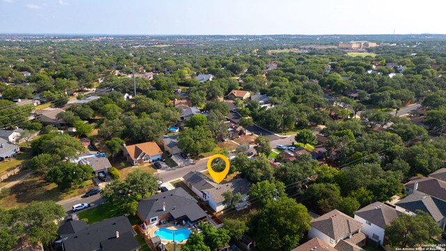 2723 Woodline, San Antonio, TX 78251 - aerial perspective of suburban area with a pool