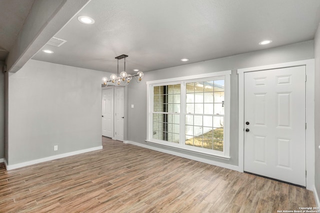 2723 Woodline, San Antonio, TX 78251 - entrance foyer with light wood finished floors, baseboards, a chandelier, and recessed lighting