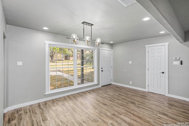 2723 Woodline, San Antonio, TX 78251 - unfurnished dining area featuring baseboards, wood finished floors, recessed lighting, and a chandelier