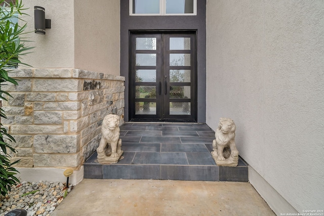 142 Wizard, Spring Branch, TX 78070 - property entrance with french doors and stucco siding