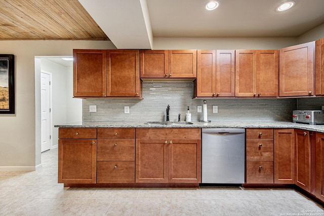 3811 E Songbird Ln, San Antonio, TX 78229 - kitchen with dishwasher, a sink, light stone countertops, decorative backsplash, and brown cabinets
