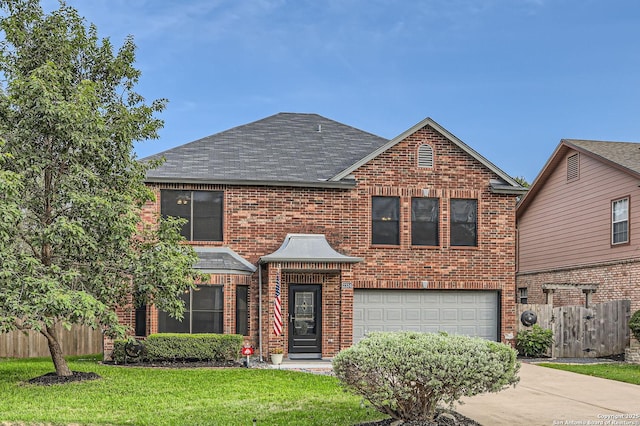 2334 Creekside Bnd, San Antonio, TX 78259 - traditional-style house featuring a shingled roof, brick siding, a garage, and concrete driveway
