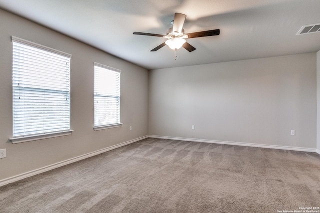 5614 Burr Blf, San Antonio, TX 78266 - carpeted spare room with ceiling fan and baseboards