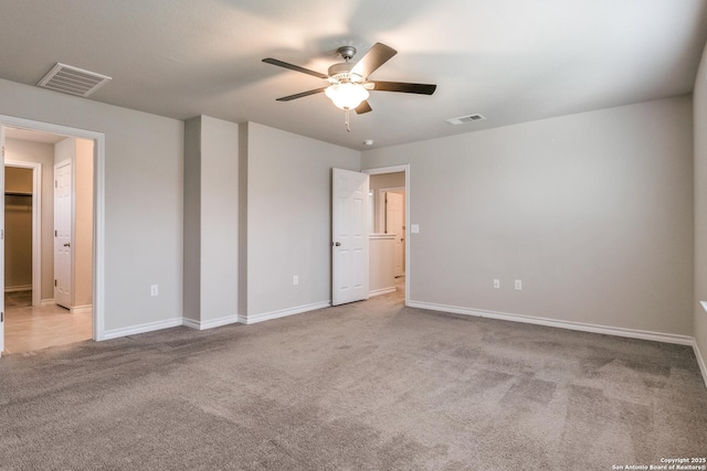 5614 Burr Blf, San Antonio, TX 78266 - unfurnished bedroom with carpet flooring, baseboards, and ceiling fan