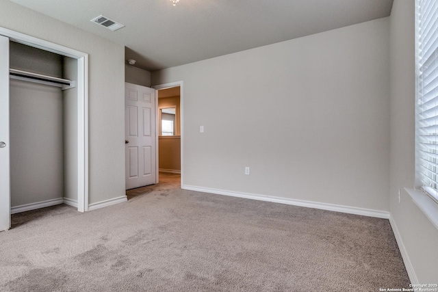5614 Burr Blf, San Antonio, TX 78266 - unfurnished bedroom featuring carpet, baseboards, and a closet