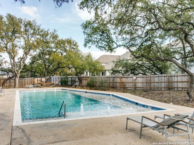 5614 Burr Blf, San Antonio, TX 78266 - view of pool featuring a fenced backyard and a patio