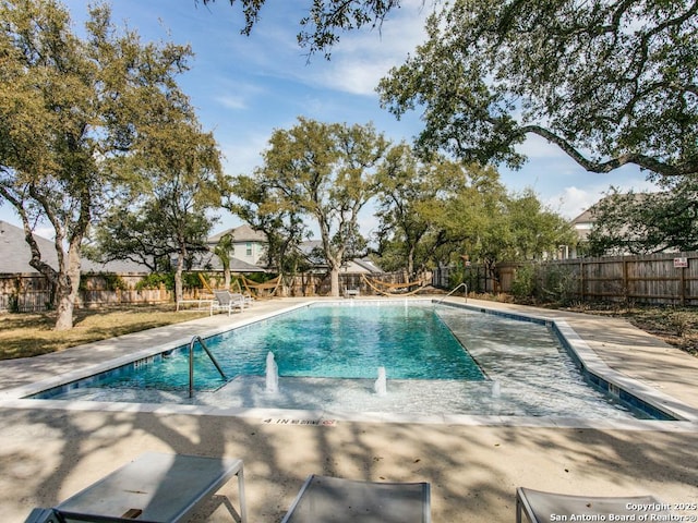 5614 Burr Blf, San Antonio, TX 78266 - view of swimming pool featuring a fenced backyard and a patio area