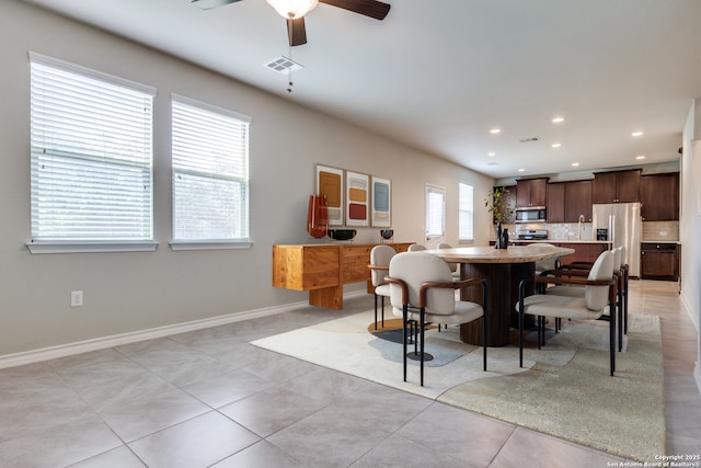 5614 Burr Blf, San Antonio, TX 78266 - dining room with ceiling fan, recessed lighting, baseboards, and light tile patterned floors