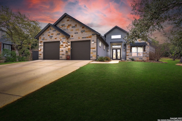 26406 Bubbling Brk, San Antonio, TX 78260 - modern home featuring french doors, a lawn, stone siding, an attached garage, and concrete driveway