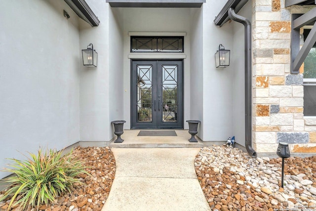26406 Bubbling Brk, San Antonio, TX 78260 - property entrance with french doors, stucco siding, and stone siding