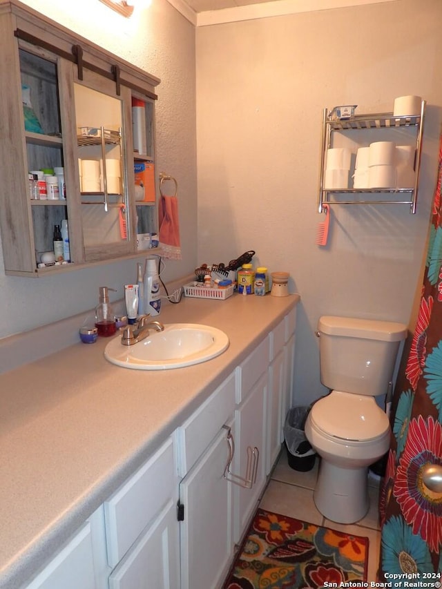 155 Scenic Cir, Lakehills, TX 78063 - full bath with vanity, toilet, and tile patterned floors