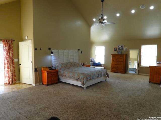 155 Scenic Cir, Lakehills, TX 78063 - bedroom with high vaulted ceiling, carpet floors, multiple windows, recessed lighting, and baseboards