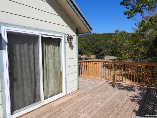 155 Scenic Cir, Lakehills, TX 78063 - view of wooden terrace