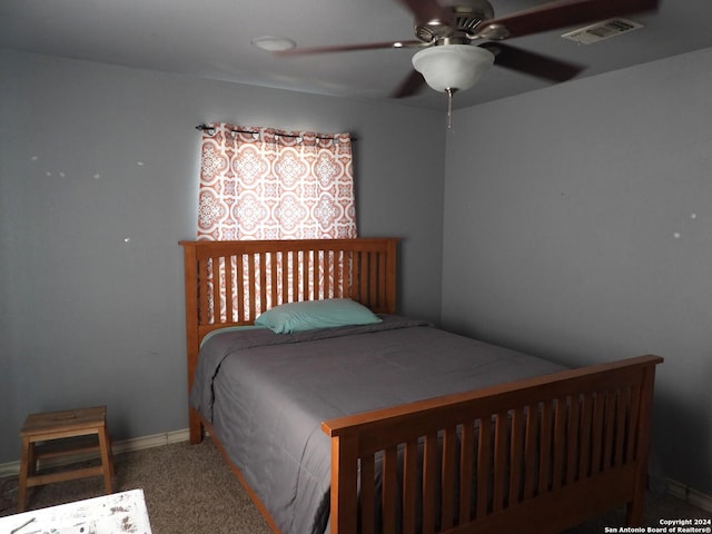 155 Scenic Cir, Lakehills, TX 78063 - bedroom featuring baseboards, carpet floors, and ceiling fan