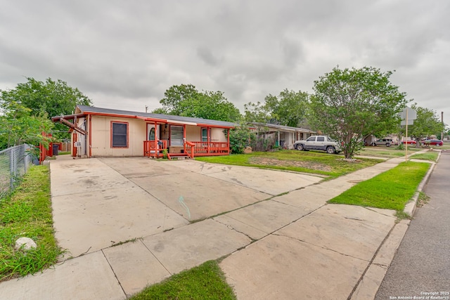 2927 Lasses, San Antonio, TX 78223 - view of front of property featuring concrete driveway and covered porch