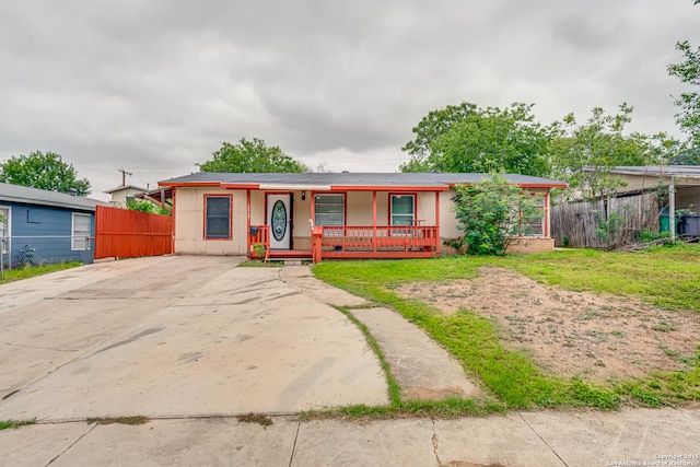 2927 Lasses, San Antonio, TX 78223 - ranch-style house featuring covered porch and concrete driveway