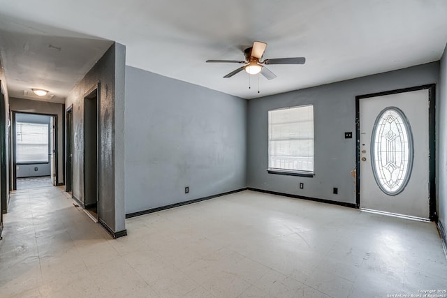 2927 Lasses, San Antonio, TX 78223 - entryway featuring ceiling fan, light floors, and baseboards