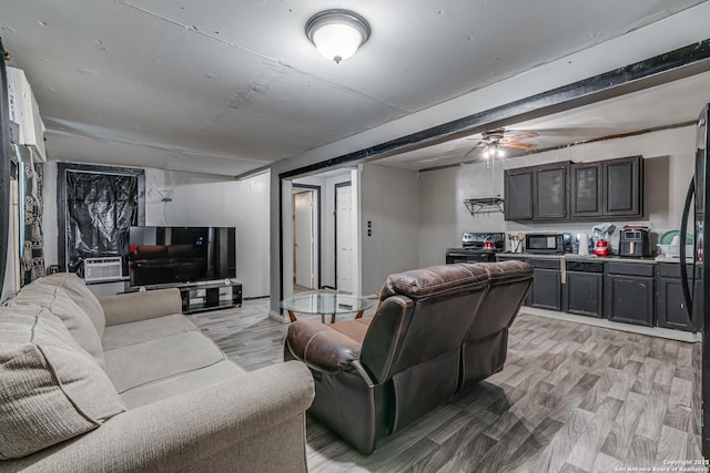 2927 Lasses, San Antonio, TX 78223 - living room featuring cooling unit, light wood-style flooring, and ceiling fan