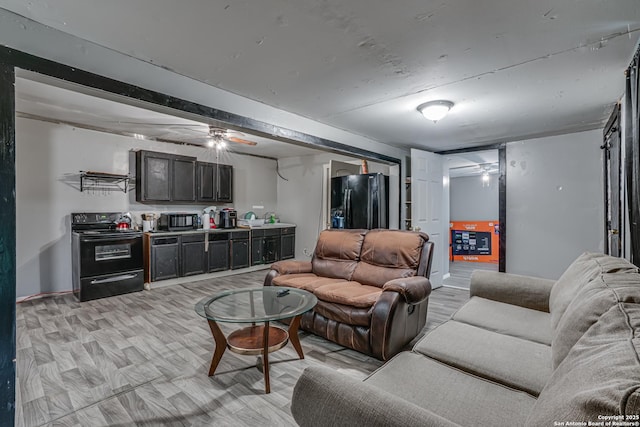 2927 Lasses, San Antonio, TX 78223 - living area featuring ceiling fan and baseboards