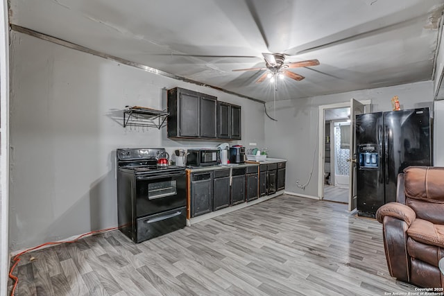 2927 Lasses, San Antonio, TX 78223 - kitchen with black appliances, ceiling fan, light wood-type flooring, light countertops, and baseboards