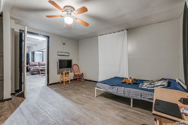 2927 Lasses, San Antonio, TX 78223 - bedroom featuring wood finished floors and ceiling fan