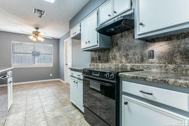 210 Cardinal, New Braunfels, TX 78130 - kitchen featuring black / electric stove, under cabinet range hood, ceiling fan, decorative backsplash, and a textured ceiling