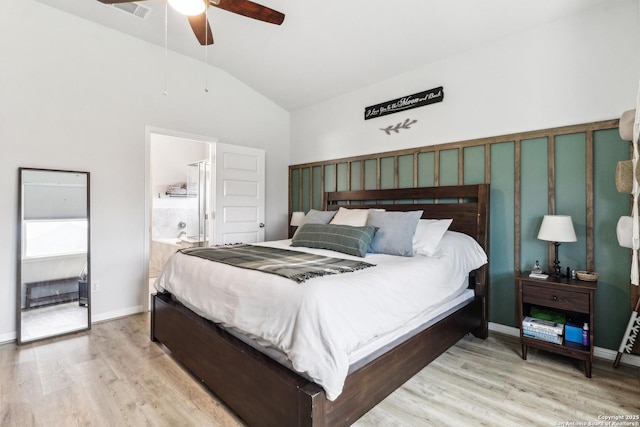 4902 Oxbow Bnd, Saint Hedwig, TX 78152 - bedroom with wood finished floors, connected bathroom, ceiling fan, baseboards, and high vaulted ceiling