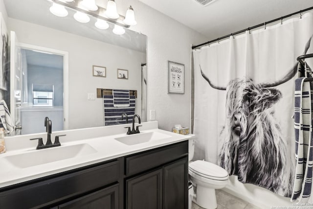4902 Oxbow Bnd, Saint Hedwig, TX 78152 - full bathroom featuring double vanity, toilet, tile patterned floors, and curtained shower