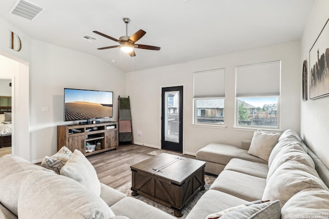 4902 Oxbow Bnd, Saint Hedwig, TX 78152 - living room featuring wood finished floors, ceiling fan, lofted ceiling, and baseboards