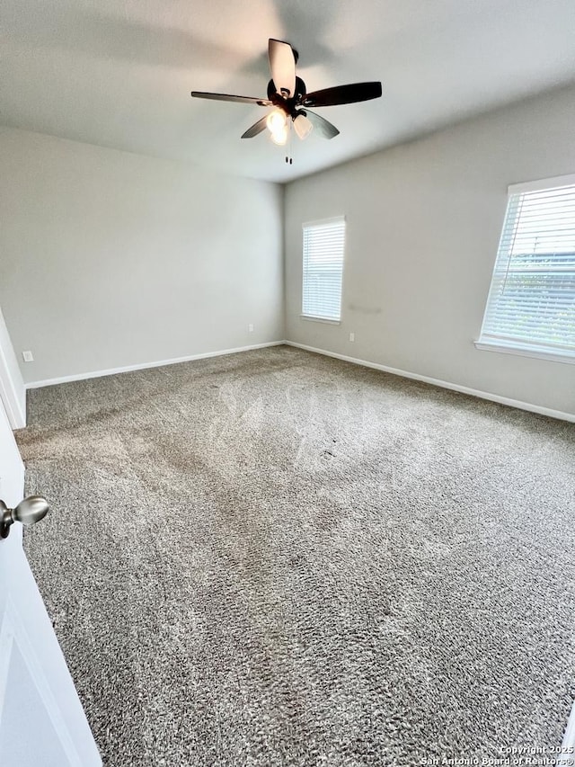 4823 Cambridge Park, Converse, TX 78109 - spare room with ceiling fan, carpet, and baseboards