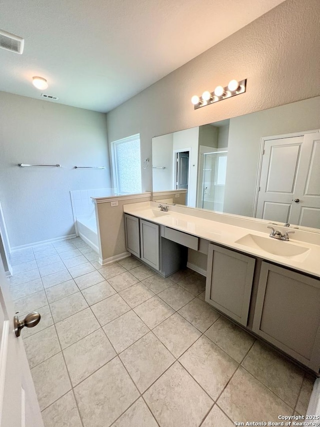 4823 Cambridge Park, Converse, TX 78109 - bathroom featuring tile patterned floors, double vanity, a bath, baseboards, and a shower