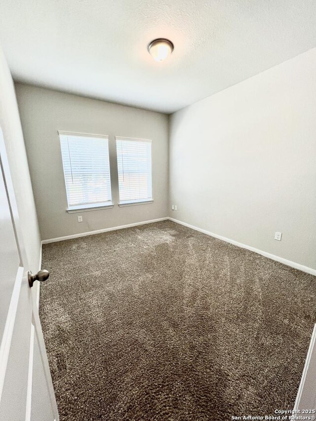 4823 Cambridge Park, Converse, TX 78109 - empty room with carpet floors and baseboards