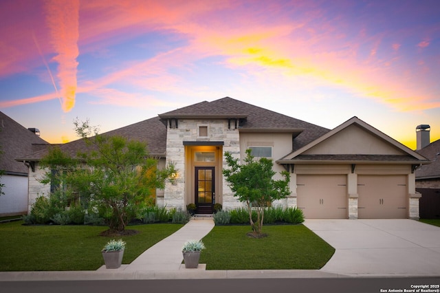 7947 Valley Crst, Fair Oaks Ranch, TX 78015 - view of front of home with stone siding, a front yard, driveway, and a garage