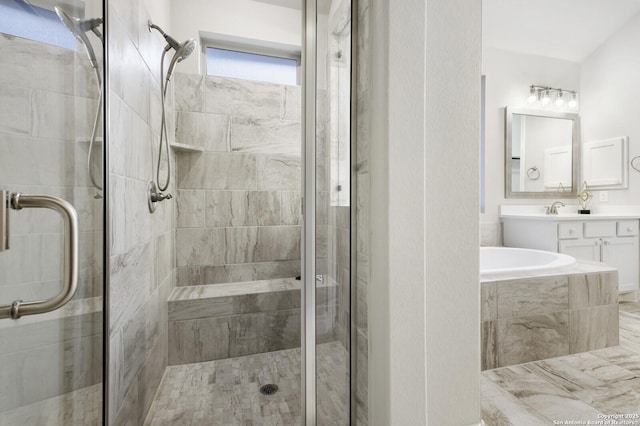 7947 Valley Crst, Fair Oaks Ranch, TX 78015 - bathroom featuring a stall shower, vanity, and a relaxing tiled tub