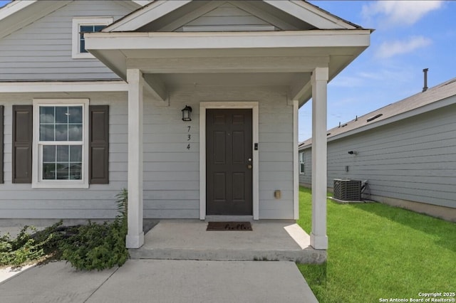 734 Ambush Rdg, San Antonio, TX 78219 - property entrance featuring central air condition unit and a lawn