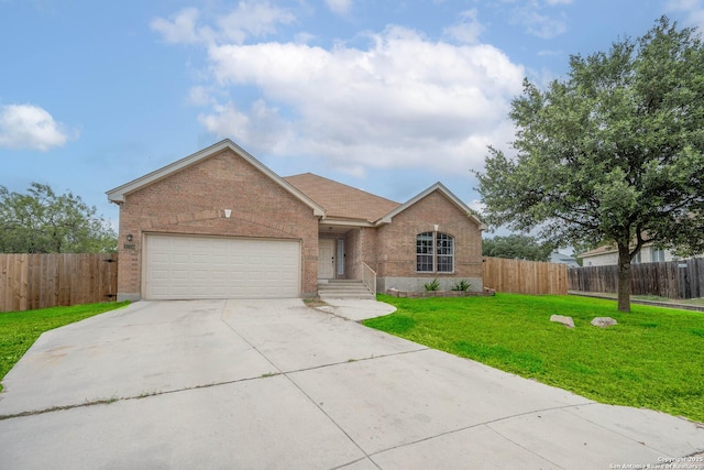 4706 Granite Shls, San Antonio, TX 78244 - view of front of home with brick siding, driveway, and an attached garage