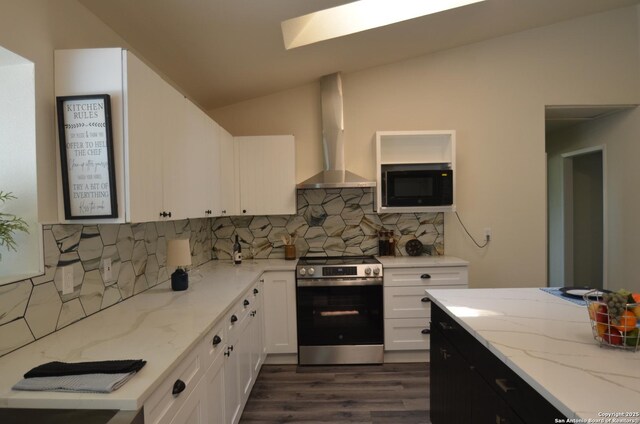 3160 Weil, Marion, TX 78124 - kitchen with stainless steel range with electric stovetop, black microwave, wall chimney range hood, dark wood finished floors, and backsplash