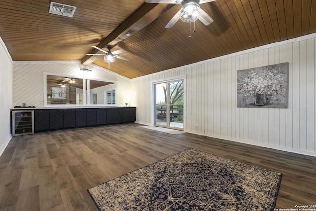 3160 Weil, Marion, TX 78124 - unfurnished living room with a ceiling fan, wine cooler, wood finished floors, wooden walls, and baseboards