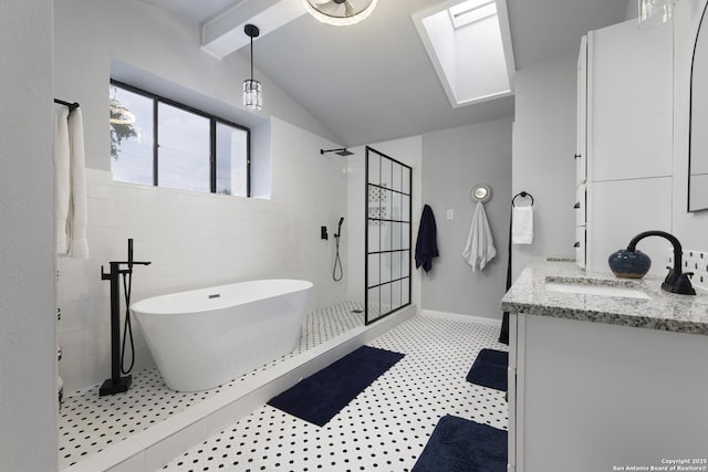 3160 Weil, Marion, TX 78124 - bathroom with vanity, a tile shower, a freestanding bath, and a skylight
