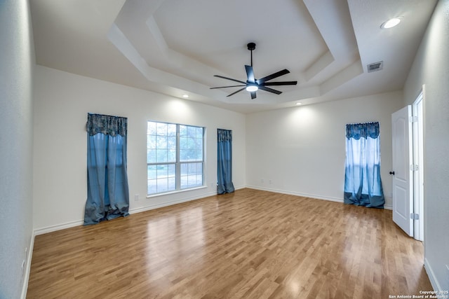 3343 Dove Park Ln, San Antonio, TX 78253 - unfurnished room with a raised ceiling, a ceiling fan, light wood-style flooring, baseboards, and recessed lighting