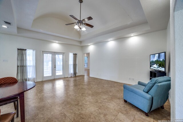 3343 Dove Park Ln, San Antonio, TX 78253 - living room with a raised ceiling, a ceiling fan, baseboards, and french doors
