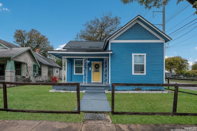 1129 N Smith St, San Antonio, TX 78207 - victorian house with covered porch