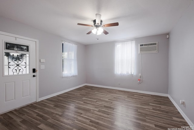 1129 N Smith St, San Antonio, TX 78207 - foyer entrance featuring healthy amount of natural light, a ceiling fan, and dark wood-type flooring