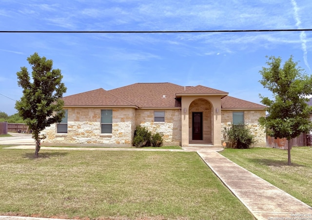 712 Crestview, Floresville, TX 78114 - view of front of house featuring stone siding