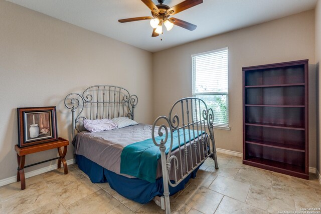712 Crestview, Floresville, TX 78114 - bedroom with baseboards and a ceiling fan